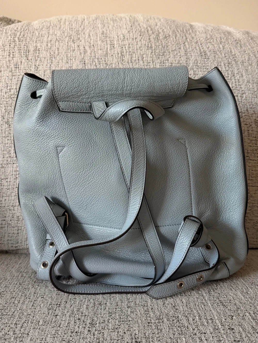 Coccinelle Pebbled Leather Drawstring Backpack in Light Blue